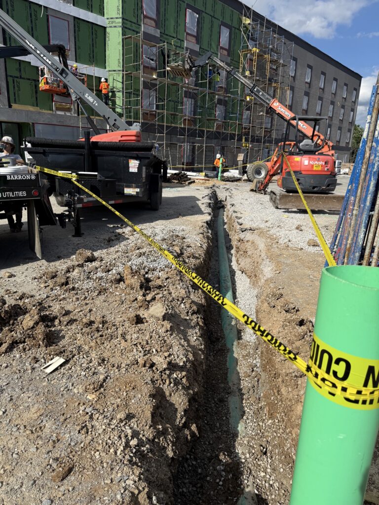 Utility trench being dug at the Echo Suites hotel site in Smyrna