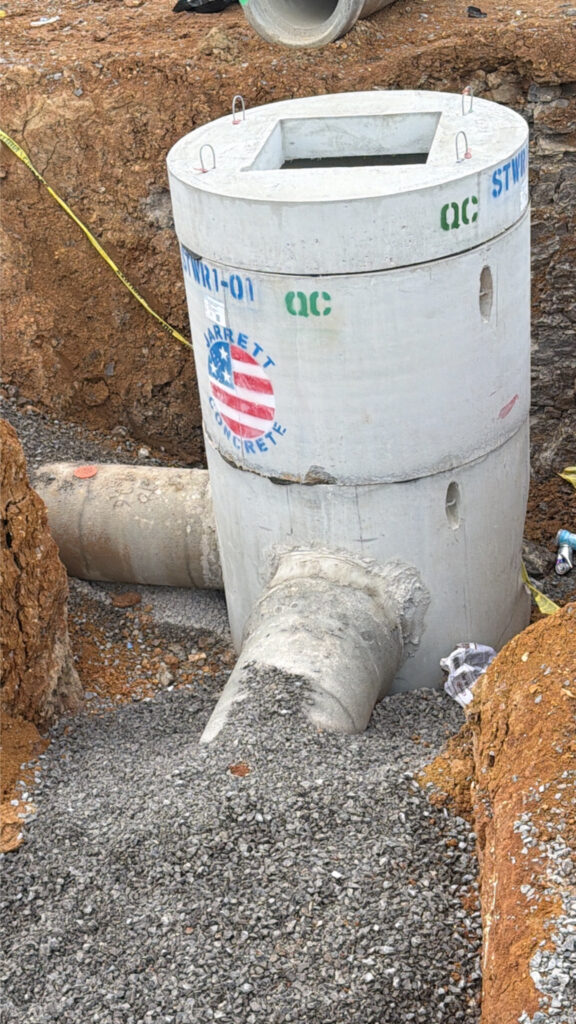 Precast manhole structure set at the McDonald's site in Smyrna