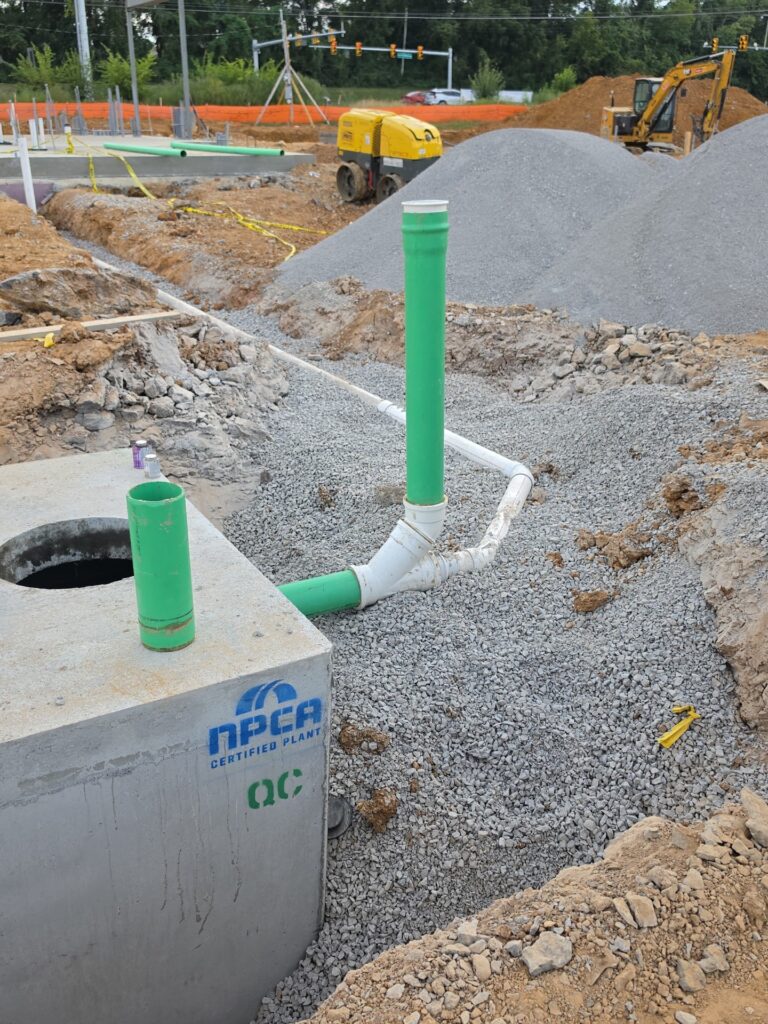 Green PVC sanitary sewer lines installed at McDonald's Smyrna