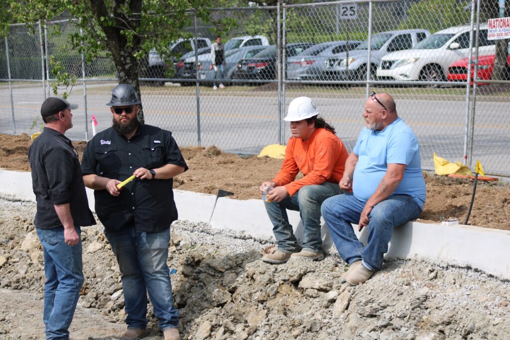 Trinity crew reviewing a graded site